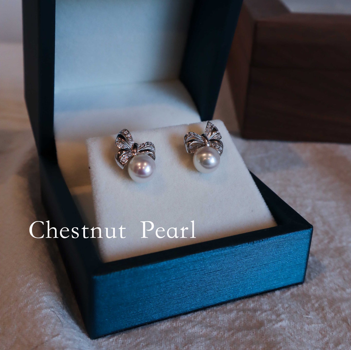 Bow Pearl Stud Earrings