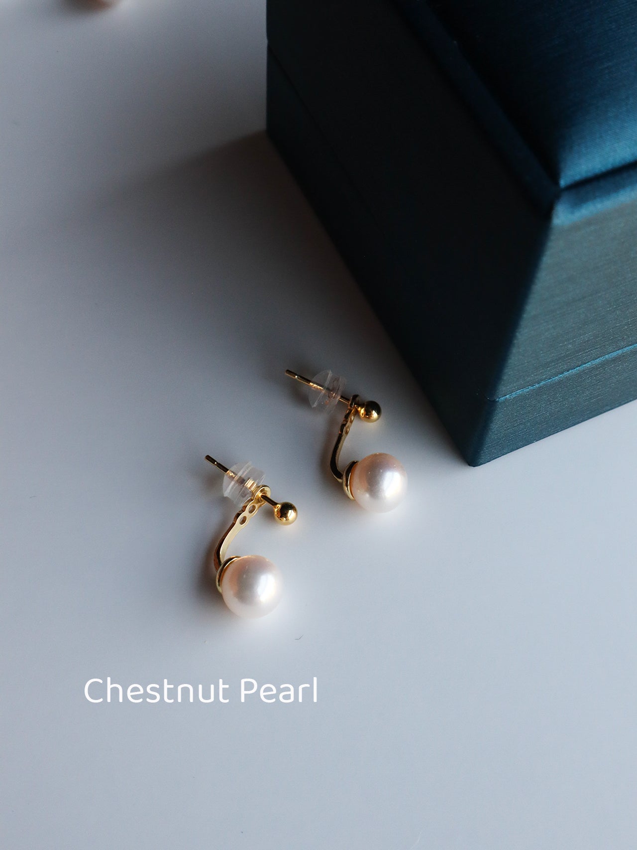 Layered Harmony: 7-8mm Pearl Mismatched Stud Earrings