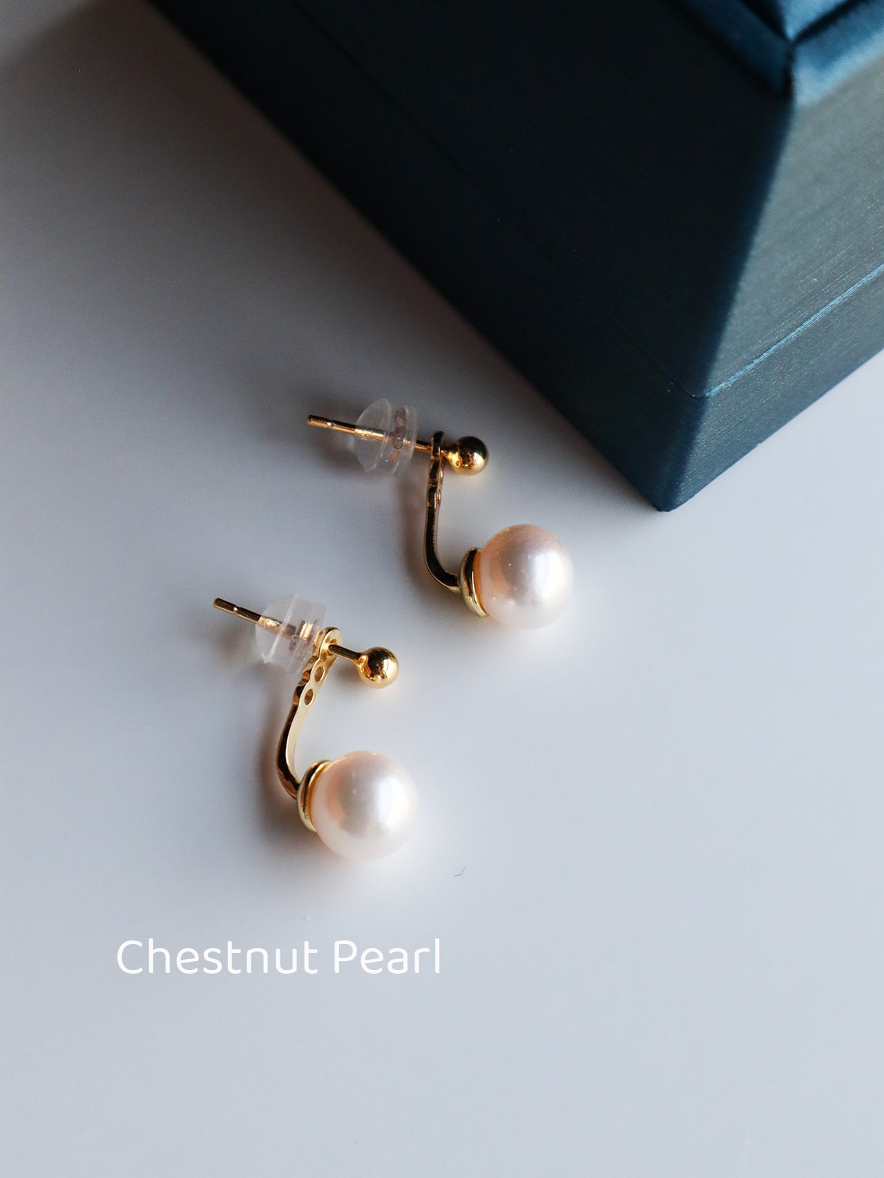 Layered Harmony: 7-8mm Pearl Mismatched Stud Earrings