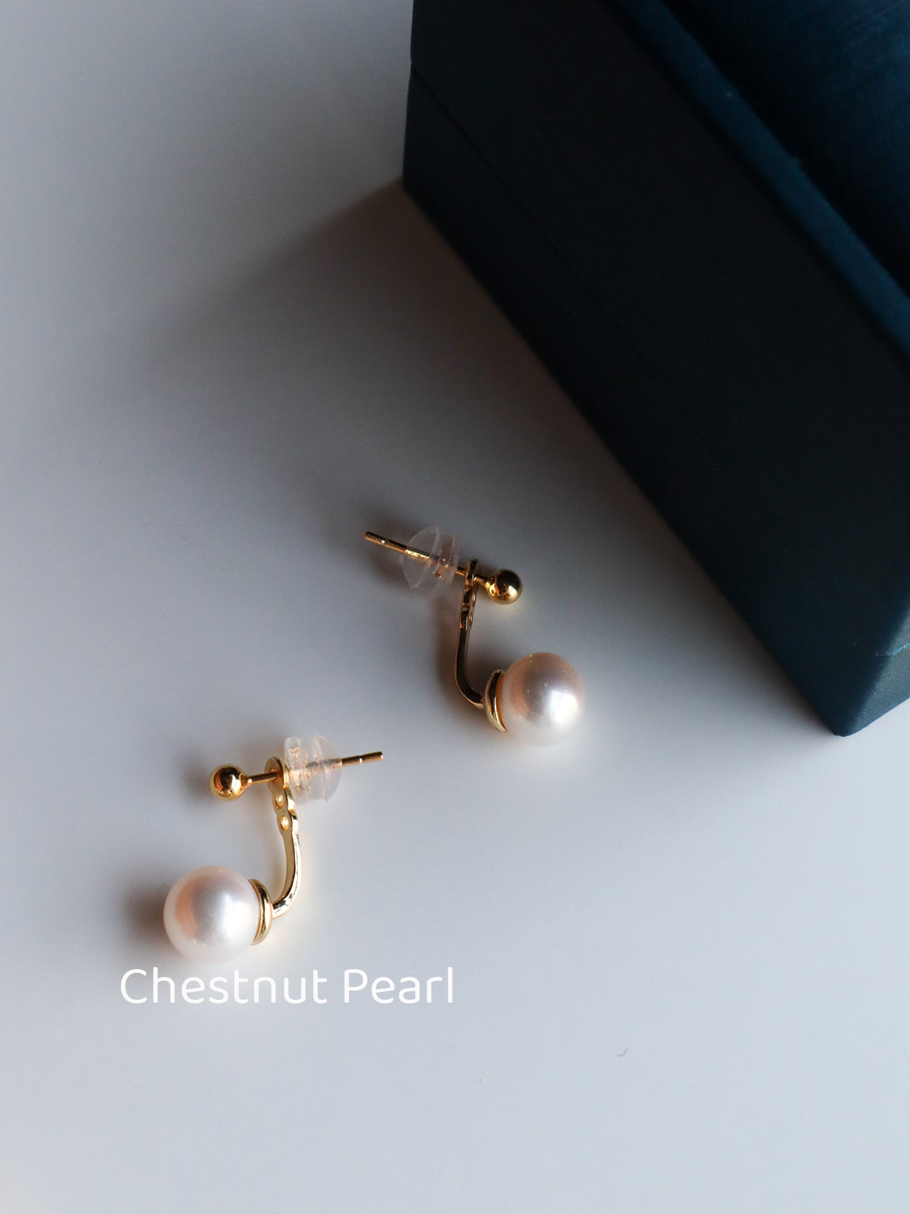 Layered Harmony: 7-8mm Pearl Mismatched Stud Earrings